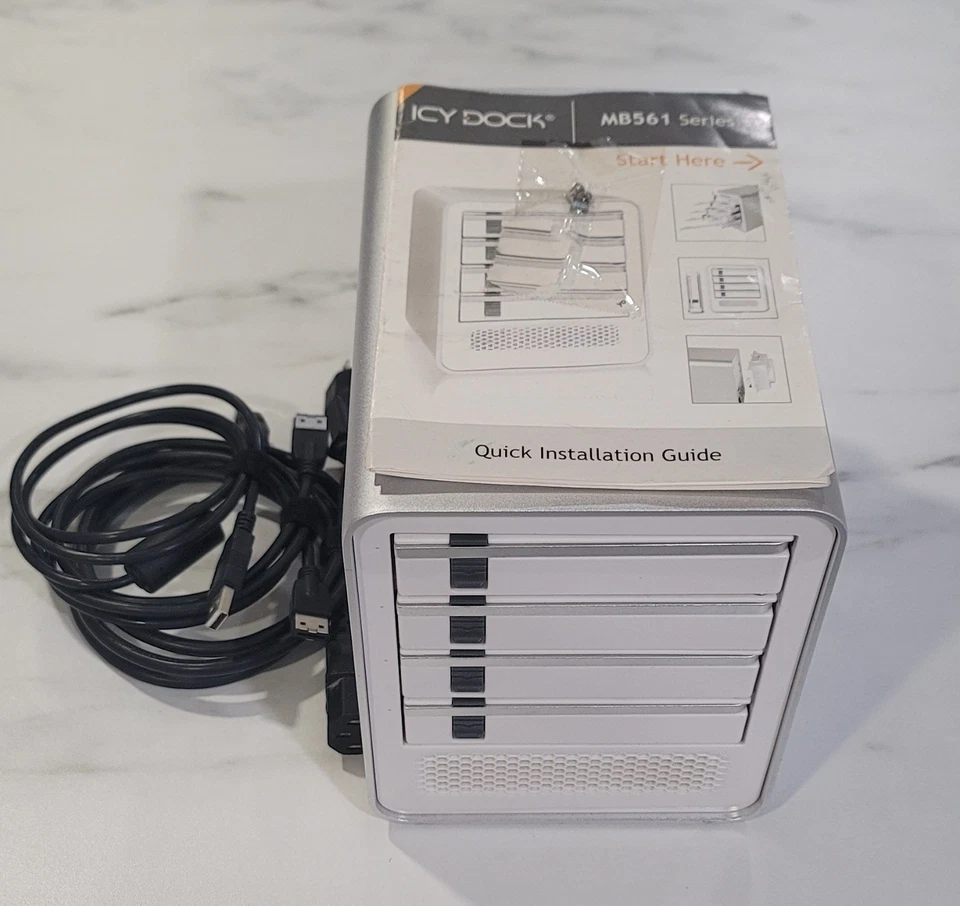 ICY DOCK ICYCube Silver 6TB (4x1.5) HDDs, Fan, Power, USB, eSATA Cable & Manuals - Image 1 of 4