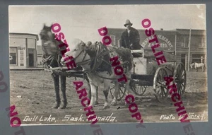 Gull Lake SK CANADA RPPC '10 GENERAL STORE Main Street COW CART nr Swift Current - Picture 1 of 3
