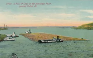 FULTON IL - Una zattera di tronchi sul fiume Mississippi che passa Fulton - Foto 1 di 2