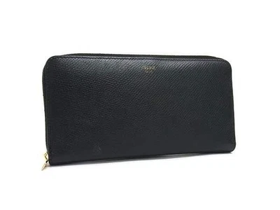 Cartera grande con cremallera CELINE en cuero negro con herrajes dorados unisex cremallera redonda Foto 1 de 4