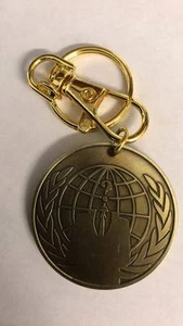 Anonymous Guy Fawkes Key Chain Ring Anon crest globe expect us Legion Bronze - Picture 1 of 2