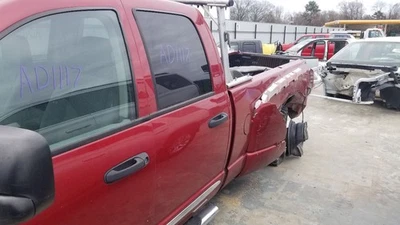 09 DODGE RAM 3500 QUAD CAB DOOR ASSEMBLY REAR LEFT DRIVER RED - Image 1 of 4