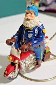 Biker Weihnachtsmann auf Motorrad mit Spielzeug Weihnachtsschmuck Harz 3,5" groß - Bild 1 von 14