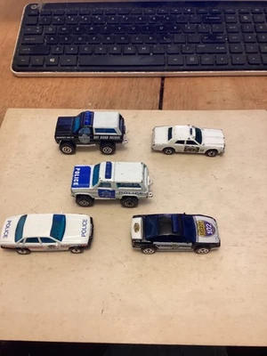 5 vintage Hot Wheels and Matchbox Police Vehicles. - Image 1 of 4