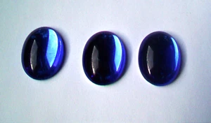 50 pcs.   25x18mm  Flat Back GLASS OVAL CABOCHON STONE - SAPPHIRE BLUE   COLOR - Picture 1 of 3