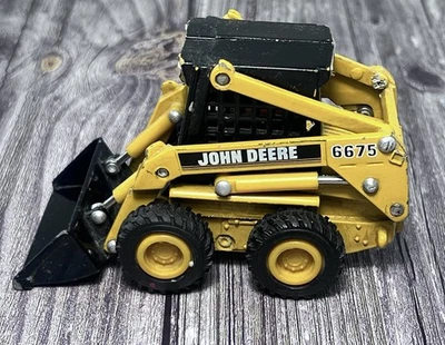 Ertl 1:32 Diecast Toy John Deere 6675 Skid Steer W/ Moveable 2" Bucket - Image 1 of 4