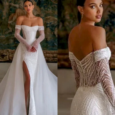 Elegantes vestidos de novia línea A hombros descubiertos abertura alta encaje lentejuelas vestidos de novia Foto 1 de 4