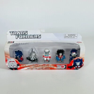Transformers NEW Collectible Figurines & 3D Puzzle Piece Collector Cards & Base - Image 1 of 4