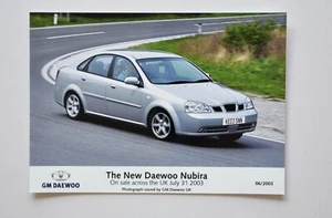Car Press Photo - 2003 Daewoo Nubira - Light Gray - Front / Side View - Picture 1 of 1
