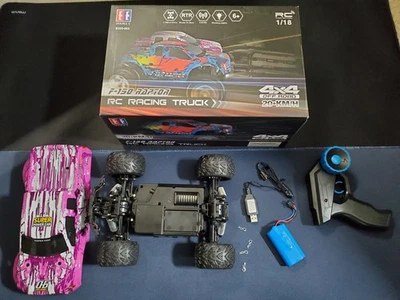 Coche de radiocontrol Monster Truck Ford Raptor F150 escala 1:18 doble E - ROSA Foto 1 de 4