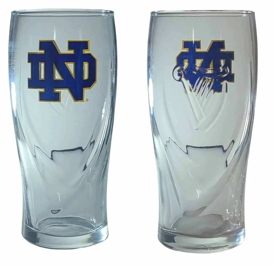 Juego de 2 vasos de pinta con monograma de arpa en relieve Notre Dame Fighting Irish Guinness Foto 1 de 1
