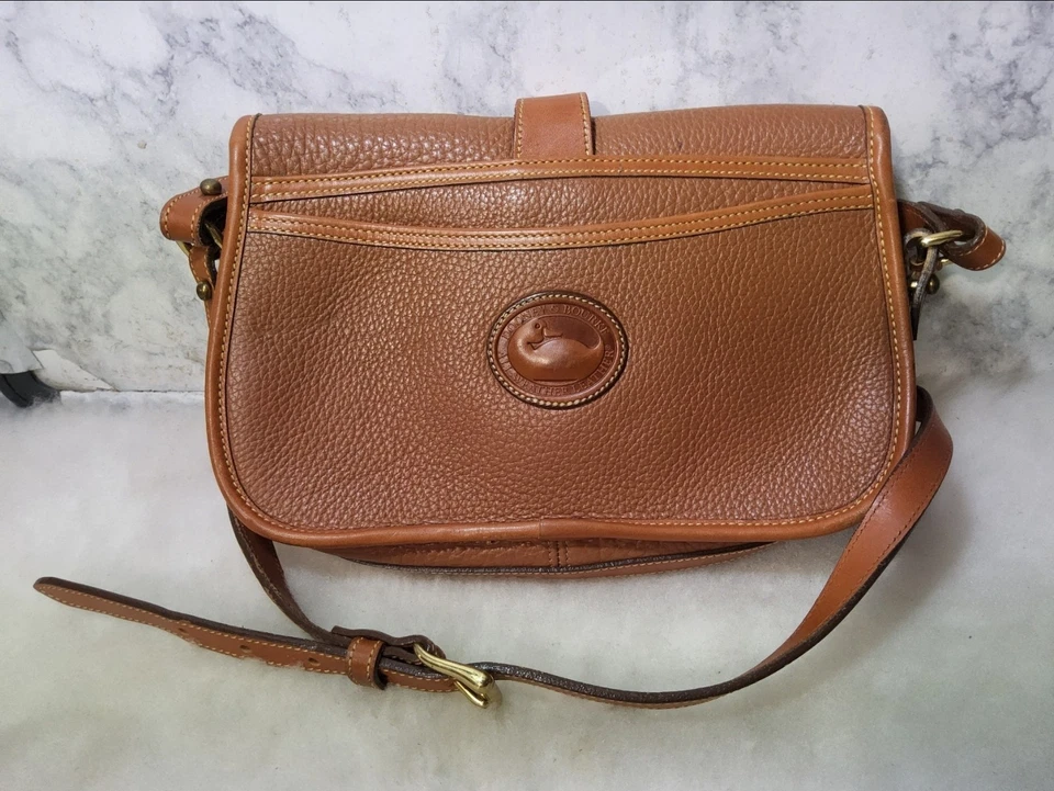 vintage Dooney Bourke Vintage Brown Kilty Crossbody Wallet Bag pebbled Leather  - Image 1 of 4