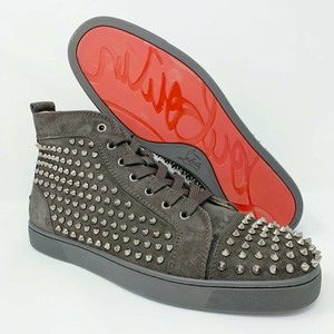 red bottom shoe designer