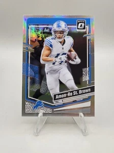 2023 Panini Donruss Optic - Holo Prizm #59 Amon-Ra St. Brown 💥 Detroit Lions - Picture 1 of 2