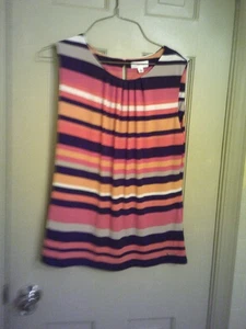 Blusa de mujer marca Calvin Klein, talla L. sin mangas, 1 botón en la espalda cuello redondo - Imagen 1 de 2