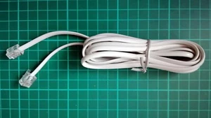 Cable línea de teléfono RJ11 beis crema 2,40 metros beige procede de un router - Imagen 1 de 3