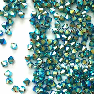 30pz Swarovski Bicone 6mm #5301/5328 AB2X Perline di cristallo - colori a scelta - Foto 1 di 6