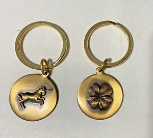 2 pc.BRASS KEYRING FOB set- INGA- ROUND shape -UNICORN, 4 LEAF CLOVER design - Picture 1 of 2