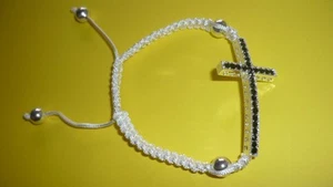 PULSERA CRUZ CORDÓN BLANCO CRISTAL STRASS NEGRO - Imagen 1 de 1