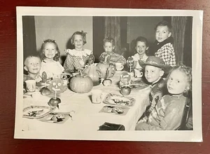 Vintage 1950s B&W Snapshot Photo Kids Halloween Decor Costumes Jack O Lanterns - Picture 1 of 4