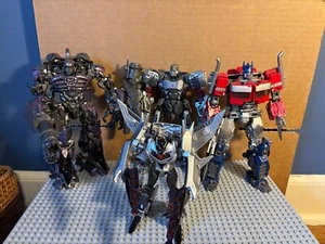 Transformers KO Optimus prime, Megatron, Shockwave, and Silver Vehicon - Picture 1 of 1