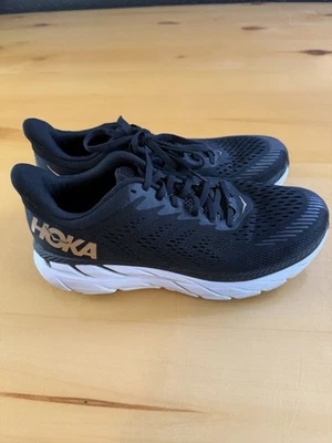 Zapatos para correr Hoka One One Clifton 7 para mujer talla 9,5 negros dorados cómodos excelentes Foto 1 de 4