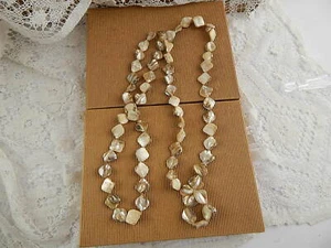 VINTAGE RARA LUNGA COLLANA SCARAMAZZE NATURALI MADREPERLA Circonferenza 125 cm. - Imagen 1 de 9