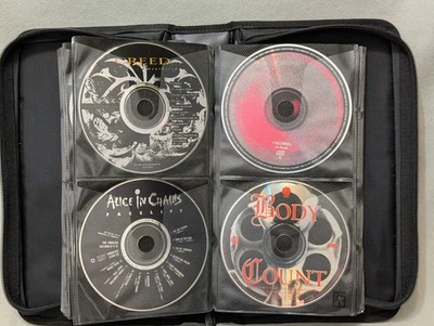 Lot 64 Misc Classical, Country & Classic Rock CDs In A Binder Foto 1 de 4