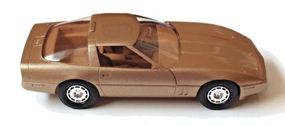 Metallic Gold 1986 Chevy Corvette 1:25 Plastic ERTL AMT Dealer Promo Model NIB - Image 1 of 4