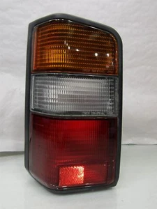 Mitsubishi Delica L300 86-94 NS left rear light lamp cluster lens - Picture 1 of 8