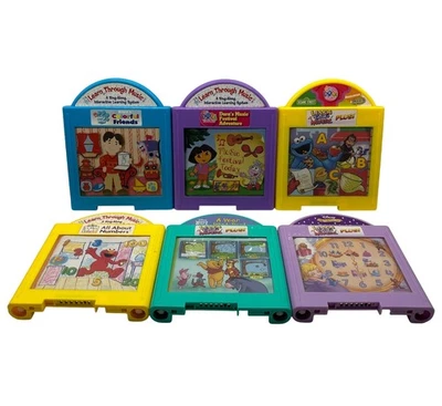 Learn Through Music 6 Cartridge Pooh, Dora, Cinderella, Blue Clues Sesame Street - Image 1 of 4