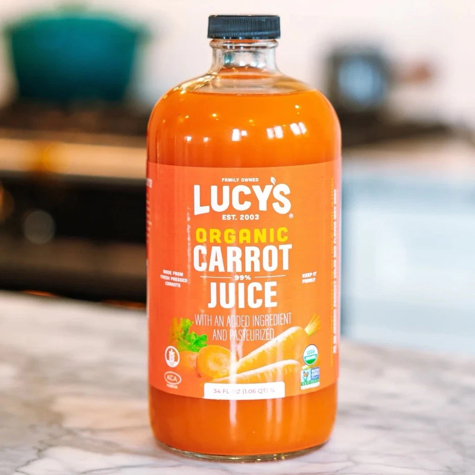 Lucy’s 99% Pure Carrot Juice - Organic, Non-GMO, Cold Pressed- 34Oz Glass Bottle - Image 1 of 4