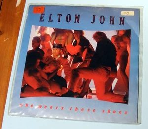 Who wears These Shoes - Elton John, 45 RPM single, 1984. VG VG - Bild 1 von 1