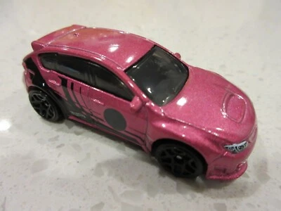 2011 Hot Wheels Subaru WRX STI Pink Nightburnerz 1:64 DIECAST Toy Race Car - Image 1 of 4