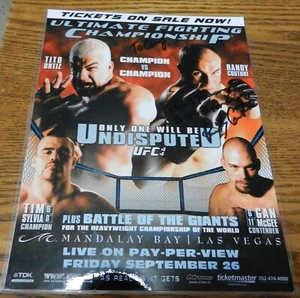 2003 "Battle of the Champions" laminated 8 X 11 Tito Ortiz Randy Couture signed - Picture 1 of 5
