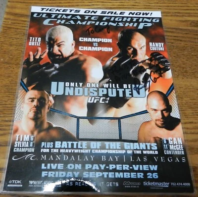 2003 "Battle of the Champions" laminated 8 X 11 Tito Ortiz Randy Couture signed - Image 1 of 4