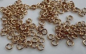 25 piezas - Anillos de salto abiertos calibre 22 de 3 mm rellenos de oro amarillo 14K (P2192) - Imagen 1 de 5