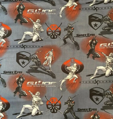 Tela de algodón GI Joe Rise of Cobra ojos de serpiente y sombra de tormenta - 1 yarda Foto 1 de 3