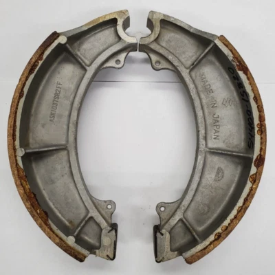 54400-15820 SUZUKI OEM NOS JUEGO DE ZAPATAS DE FRENO DELANTERAS 68-78 T500 TITAN GS400,X Foto 1 de 4