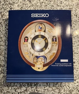 Reloj de pared musical Seiko Melodies In Motion 2005 8 canciones de los Beatles QXM134BRH (NUEVO) - Imagen 1 de 4