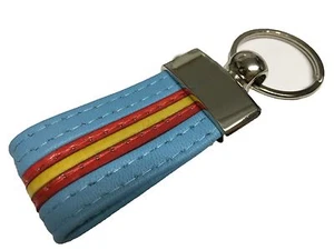LLAVERO DE PIEL AZUL CON BANDERA DE ESPAÑA (PRODUCTO ARTESANO 100 %) - Imagen 1 de 1