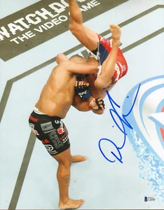 DANIEL CORMIER SIGNED AUTO'D 11X14 PHOTO BAS COA UFC VS DAN HENDERSON SLAM 173 A - Picture 1 of 1
