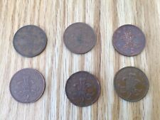 six 2 pence coins