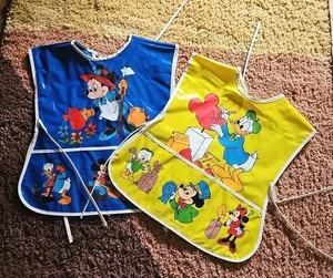 Walt Disney Spill Buster Smock Vintage Menge 2 Mickey Minnie Donald Vinyl RAR - Bild 1 von 12