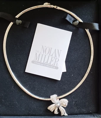 Brillante Arco Slide y Collar Omega de la Colección Nolan Miller Glamour Foto 1 de 4