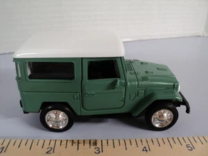 Maisto 1:36 Scale Diecast 1960 Toyota FJ 40 Land Cruise Front Doors Open New - Picture 1 of 10