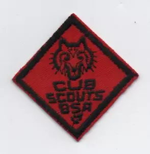 Wolf Cub Rank Patch (1955-72), Red Twill, Plastic Over Gauze Backing, Mint! - Picture 1 of 2