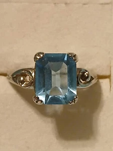 VTG Avon Signed 1980's Emerald Cut Faux Blue Ice Topaz Silver Tone Ring Sz. 5 - Picture 1 of 6