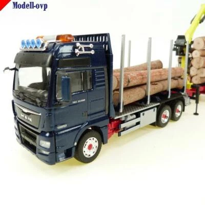MAN TGX Holztransporter mit Ladekran blau Kurzholz Anhänger Conrad Modelle con 7 - Image 1 of 4