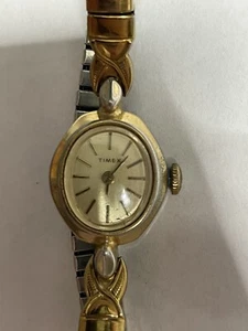 VINTAGE TIMEX GOLD & SILVER TONE LADIES SWISS MADE MECHANICAL WATCH WORKS GREAT! - Picture 1 of 4